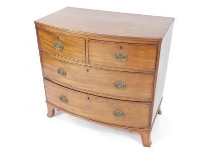 A George III mahogany bow front chest of drawers