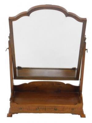 A Georgian style walnut swing frame toilet mirror