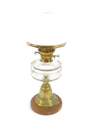 An Art Nouveau brass oil lamp