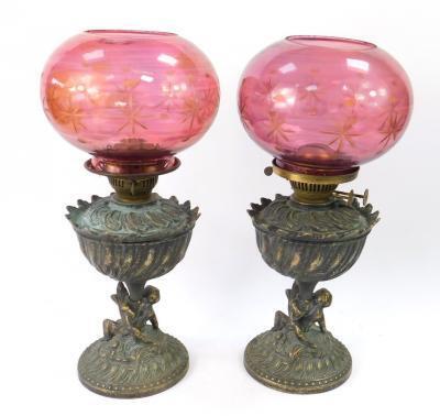 A pair of brass oil lamps