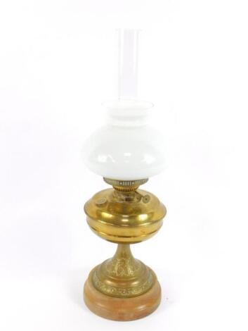 A duplex brass oil lamp