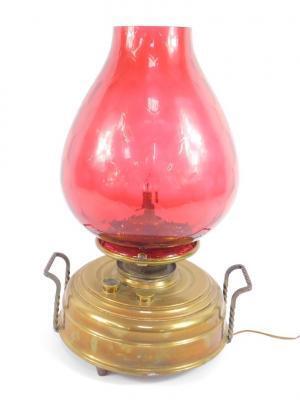 A brass burner oil lamp