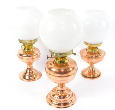 Three copper oil lamps