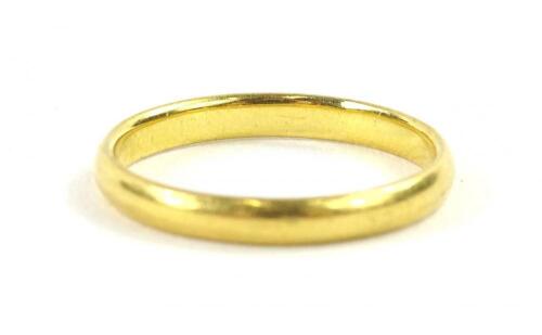 A thin 22ct gold wedding band