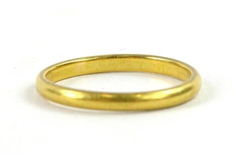 A thin 22ct gold wedding band