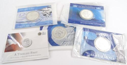 Four silver Britannia coins 2004