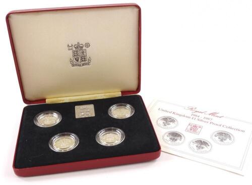 The Royal Mint 1984-1987 United Kingdom one pound silver proof collection.