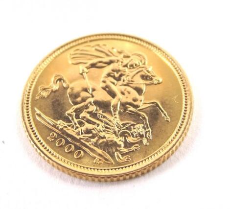 A 2000 half gold sovereign.