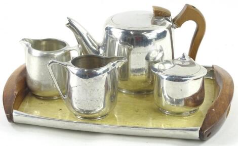 A Piquot ware aluminium four piece tea set