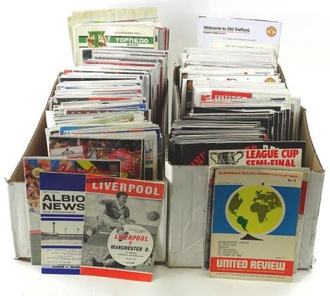 A large quantity of Manchester United home football programmes