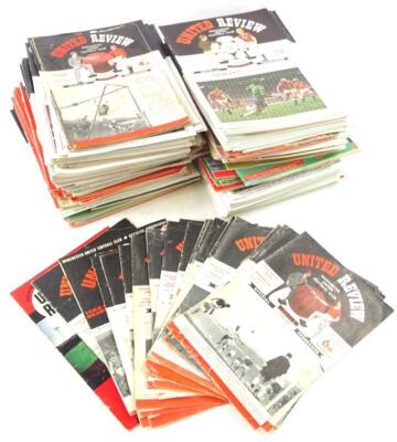 A quantity of Manchester United football programmes