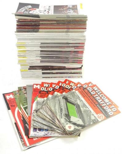 A large quantity of Manchester United football programmes