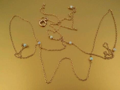 A trace chain set with opal beads at intervals (7)