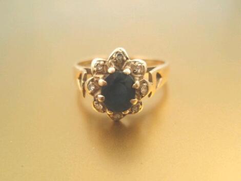 A 9ct gold blue and white stone cluster dress ring