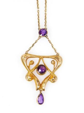 An Edwardian 9ct gold and amethyst Art Nouveau drop pendant