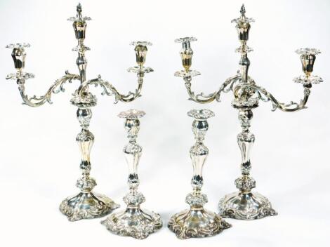 A set of four Victorian silver candlesticks