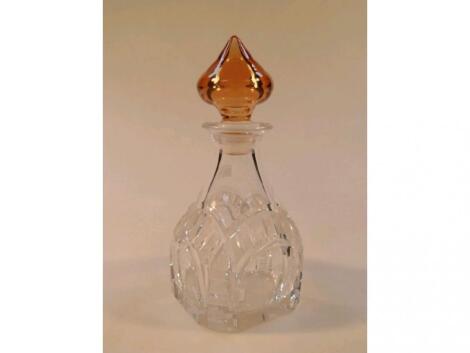 A heavy cut glass square form decanter