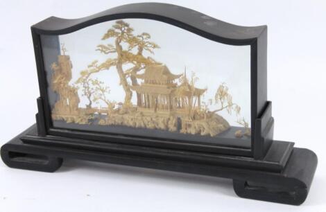 A early 20thC ebonised cork diorama