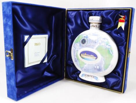 An XO Cognac P&O Cruises Auora ceramic decanter with contents