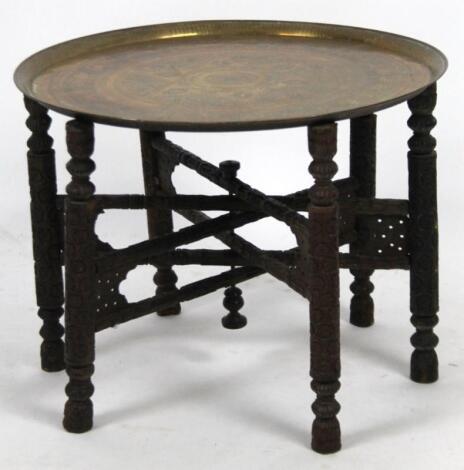 A Burmese style brass top table