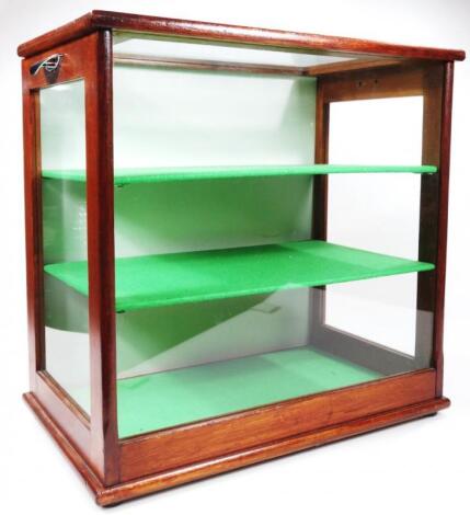 A 20thC glazed display cabinet