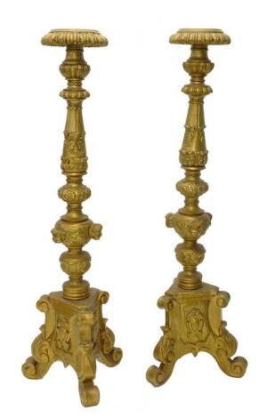 A pair of gilt wood and gesso Continental plant or urn stands