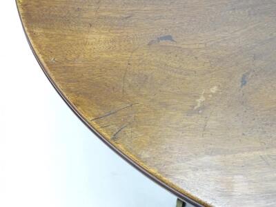 A mahogany extending dining table - 2