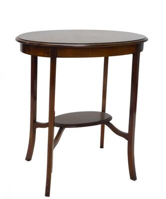 An Edwardian mahogany and chequer banded oval occasional table