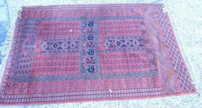 An Afghan style rug