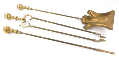 A set of three brass fire implements