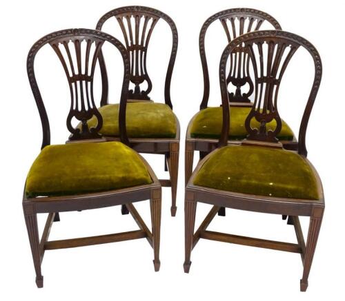 A set of four George III style mahogany dining chairs