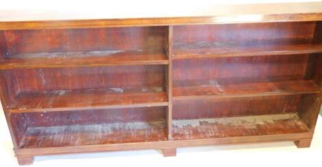 A mahogany open bookcase