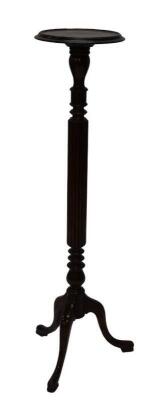 A mahogany torchere