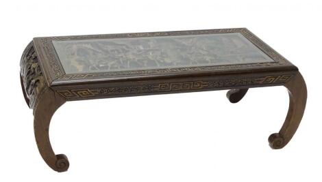 A carved Chinese hardwood coffee table