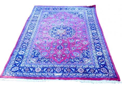 A Persian Meshed carpet
