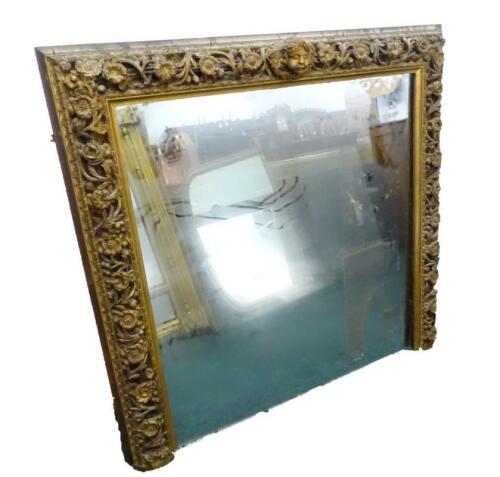 A Continental gilt wood overmantel mirror