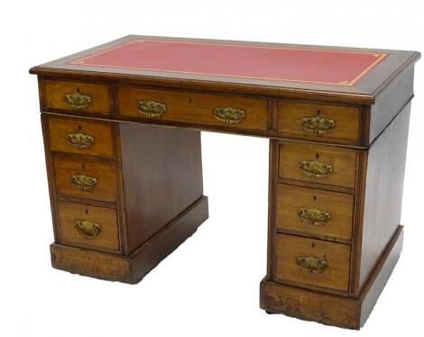 A mahogany pedestal desk