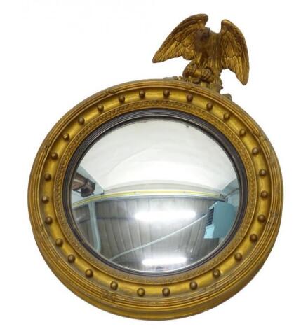 A Regency giltwood convex wall mirror