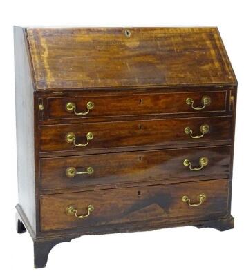 A George III mahogany ebony strung bureau