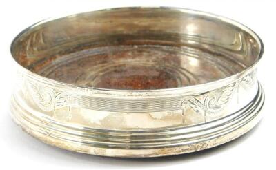 A 20thC silver mounted wine coaster
