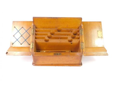 A Victorian oak stationery cabinet