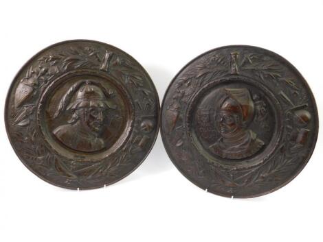 A pair of Belgian late 19thC copper wall chargers