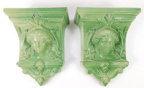 A pair of Albion Ceramics 20thC green glaze pottery wall pockets