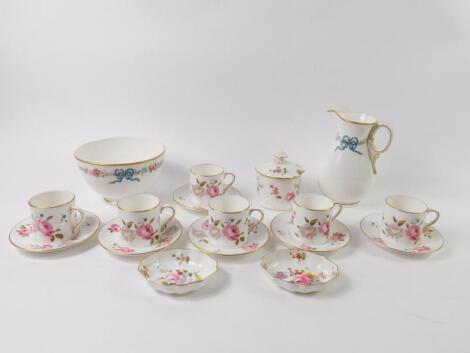 A set of six Royal Worcester porcelain coffee cans and saucers