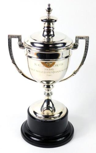 A George V silver sporting trophy and cover