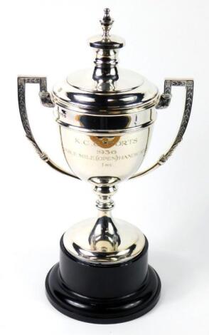 A George V silver sporting trophy and cover