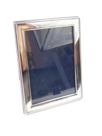 A silver rectangular framed strut photograph frame