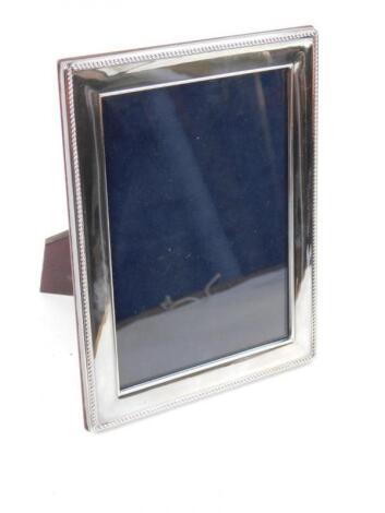 A silver rectangular framed strut photograph frame