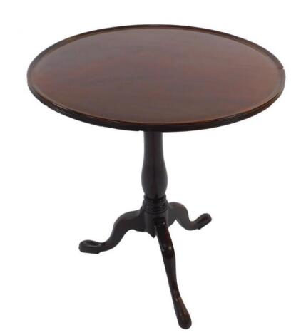 A George III mahogany tilt top circular occasional table