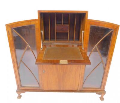 An Art Deco walnut break top secretaire bookcase